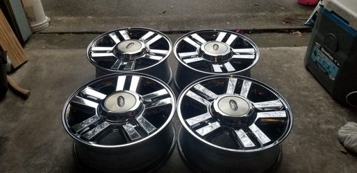 18" f-150 chrome wheels also could fit expedition no curb rash clean clean.asking for $300