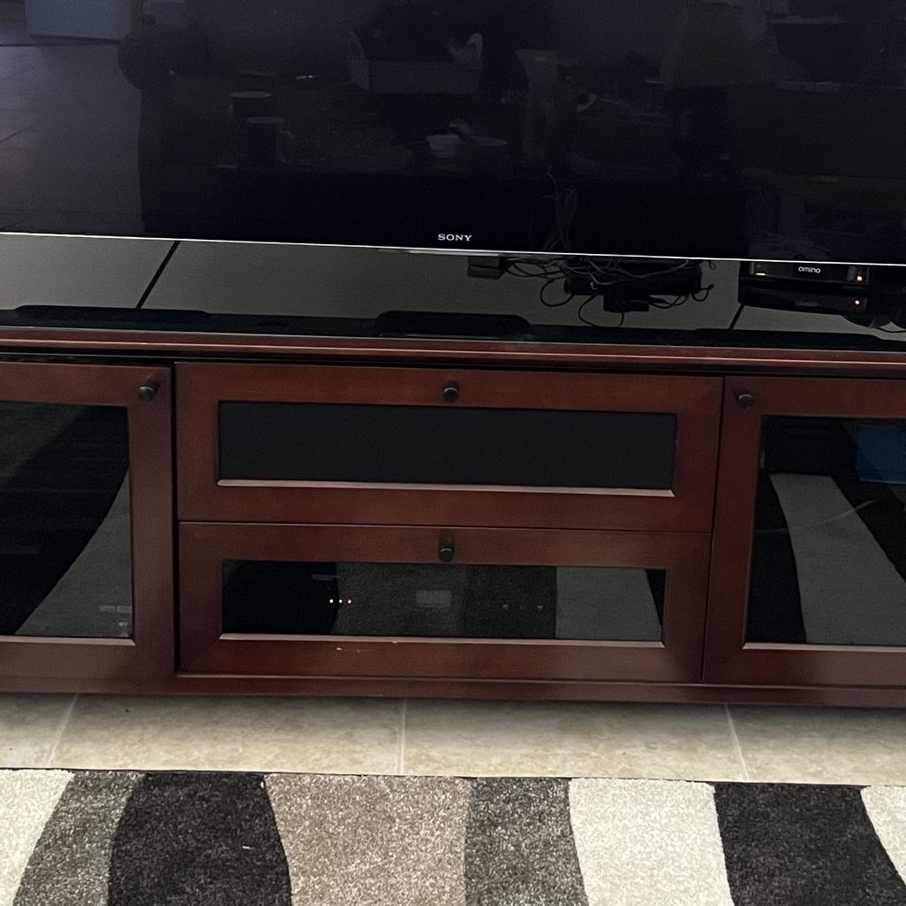 BDI USA brand  media entertainment unit/TV stand with on wheels.