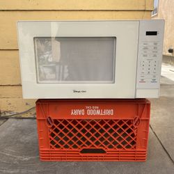 Magic Chef 1.1 cu. ft. Countertop Microwave, 1000 Watts, Light is out, Everything else works excellent. 