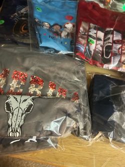 Halloween T-shirts and hoodies T-shirts are 10 each by two. Get one free.