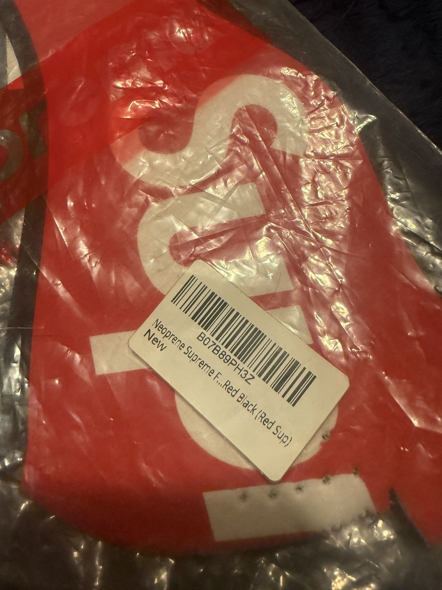 Supreme logo face mask