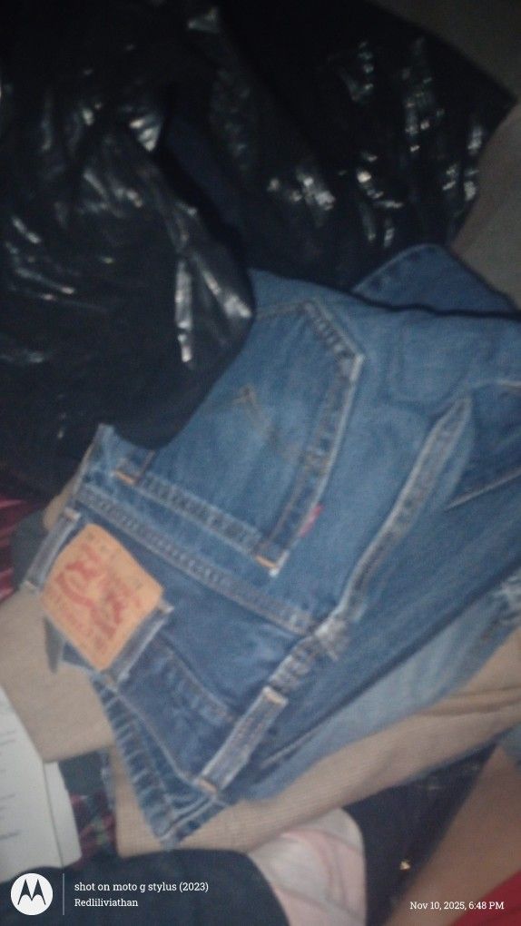 3 full bags of men's clothing size 30W-32L