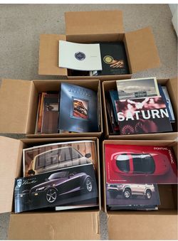 Tons of manufacturer car brochures from early 1990s to early 2000's
