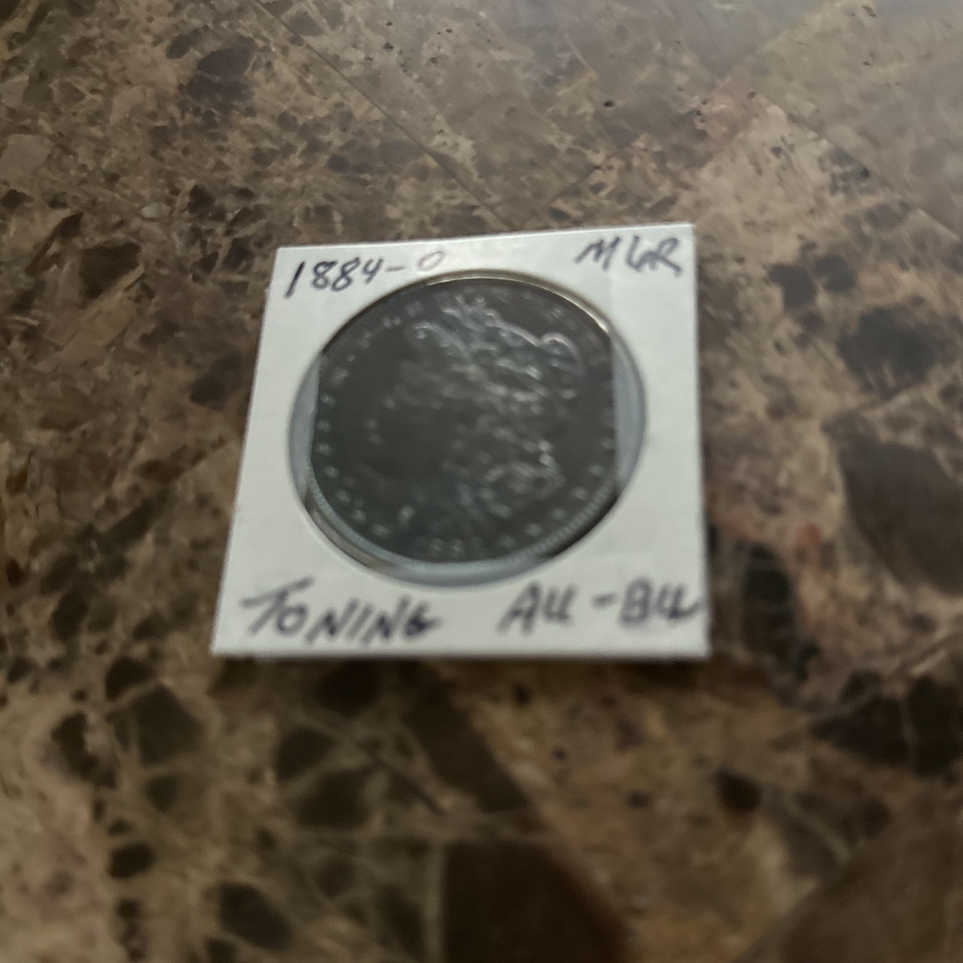 1884 O Morgan Silver Dollar  Toning AU- BU