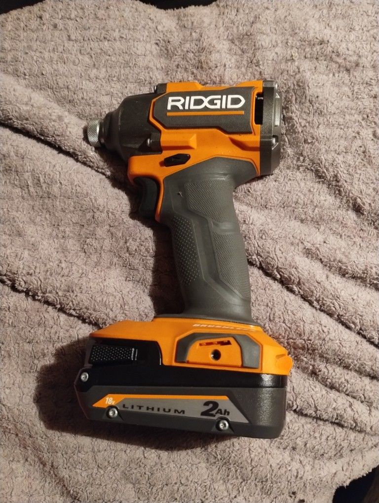 RIDGID 18V Brushless 4-Mode 1/4 in. Impact Driver with 2 ah battery