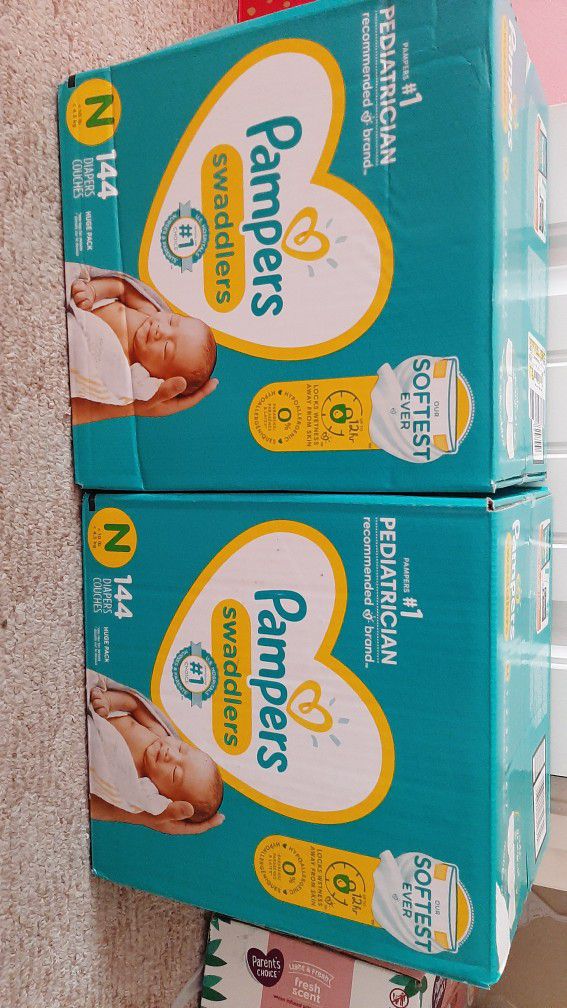 Two New Boxes Of Diapers Size Newborn