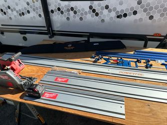 Milwaukee track saw with tracks and battery.