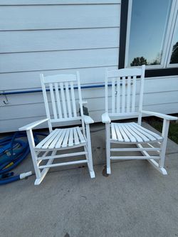 Set of white rocking chairs