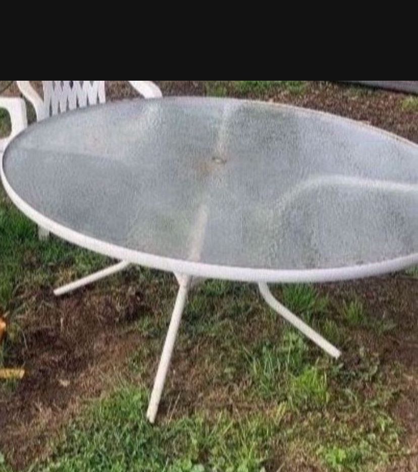 Large Table And 3 Plastic Chairs
