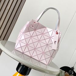 A pink Issey Miyake bag