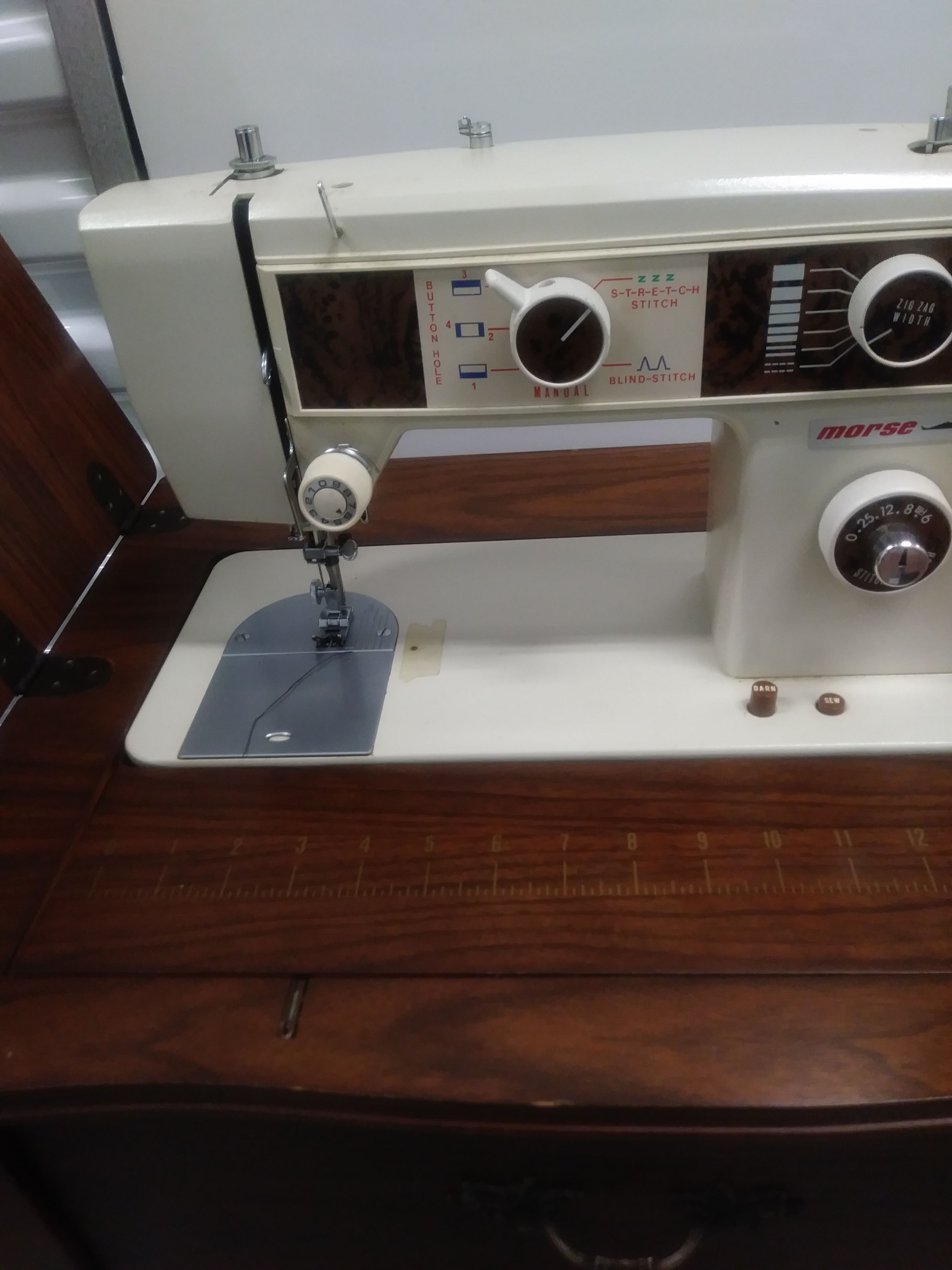 Vintage sewing machine in table