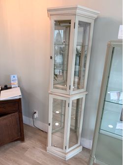Wooden and glass cabinet with lighting