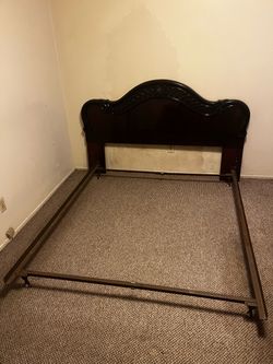 Dark Wood Carved Headboard with Metal Bed Frame