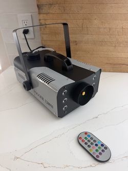 FOG Machine 1200 Watts Brand NEW! With multiple color LED’s Lights and wireless Remote