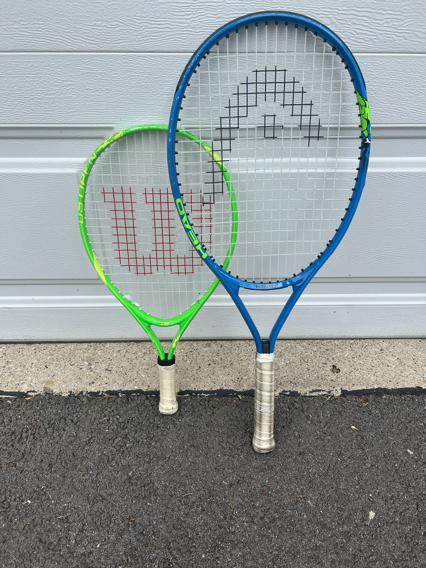 Two Kids Head and Wilson Tennis Rackets