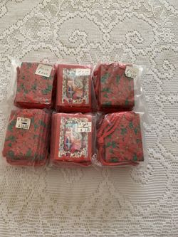 Small RED CHRITSMAS RED. GIFT BAG WITH GIFT TAG FOR SMALL PRESENTS. 3”L X 2  2/4”W 72 At $2.25 $13.50