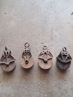 Old wooden pulley