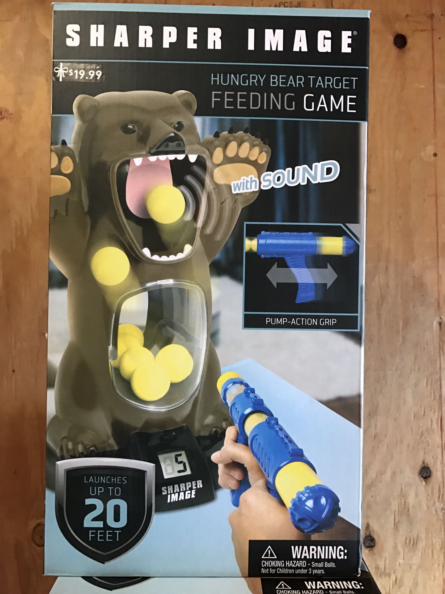 Bear feeding target game sharper image
