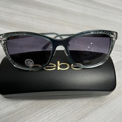NEW Bebe BB7214-424 TEAL Square Cat-Eye Sunglasses w/ Swarovski Crystals w/ Case  This gorgeous model from Bebe showcases a flattering square cat-eye 