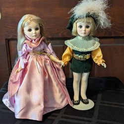 Rapunzel and Prince Charming, both with doll stands