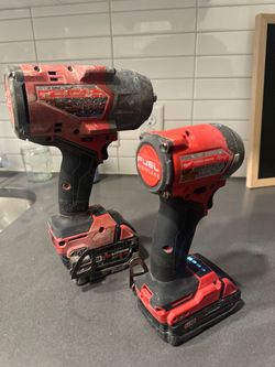 Milwaukee brushless impacts Set roughly new and used  1/4 and 1/2 with batteries included