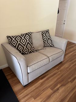 Beige Fabric Loveseat with Accent Pillows