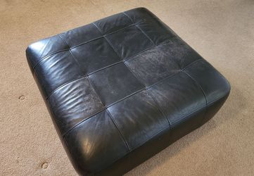 Real leather ottoman $90