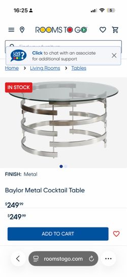 Round glass with silver base coffee table