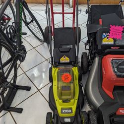 Ryobi Lawnmower With Battery And Charger 