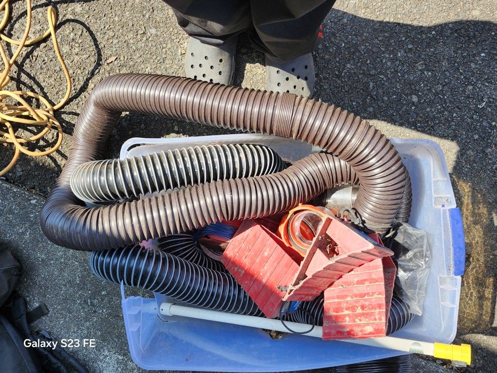 RV Sewer Pipes With Stand Tank Wand, Tire Chocks.