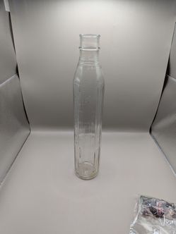 Vintage 1920s shell Penn oil bottle
