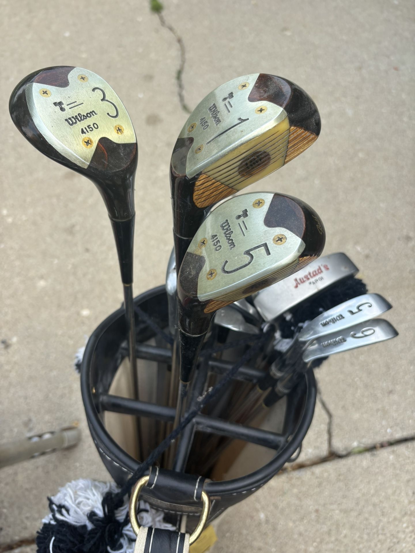 Women’s golf clubs and I’ll throw in the ball retriever