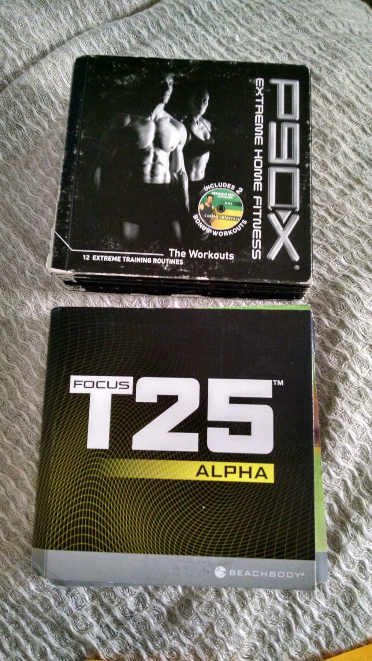 P90x and T25 workout dvd sets