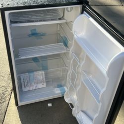 Brand new mini refrigerator with freezer for $100