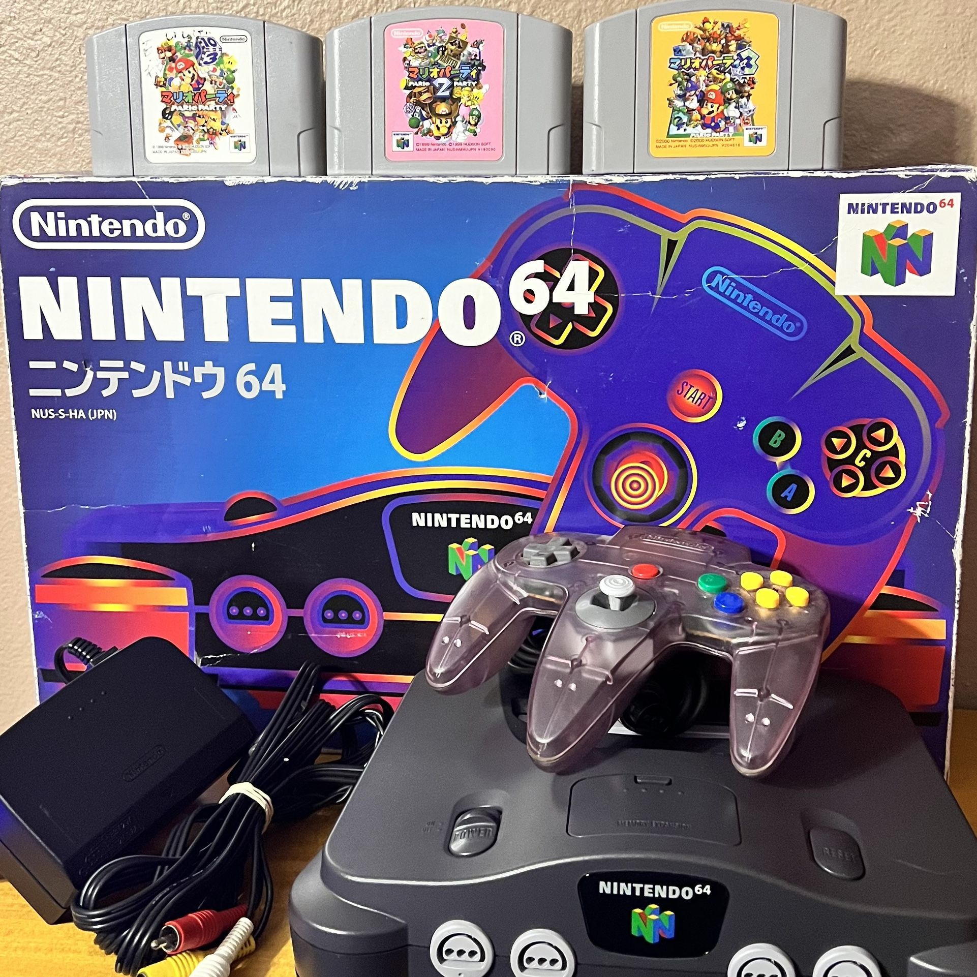JP Nintendo 64 in box (plays US and JP games) + Mario Party 1,2,3 games