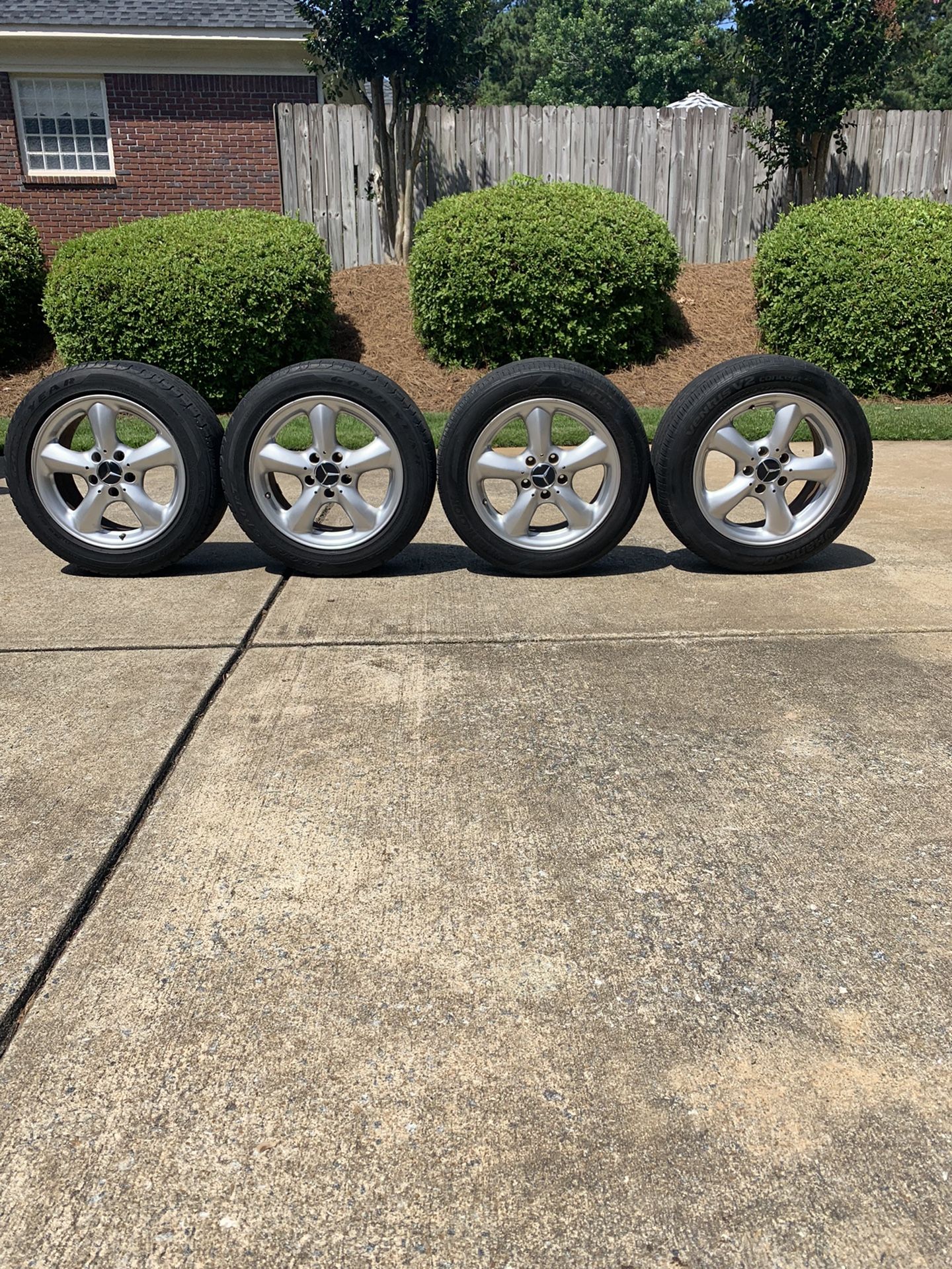 Beautiful set of rims and practically new tires 16 inch for a Mercedes SL or SLK or any Mercedes
