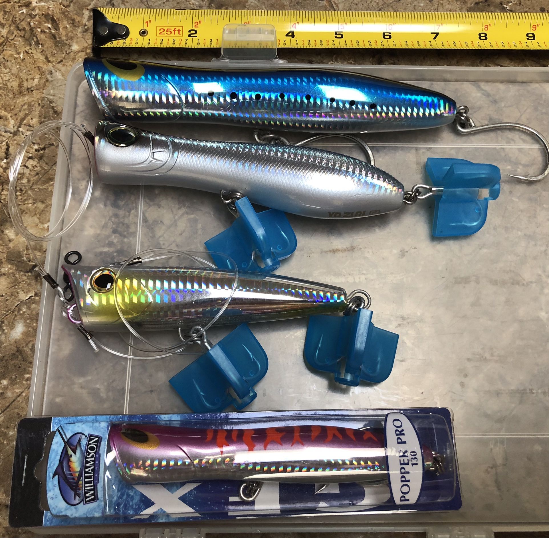 4 saltwater poppers, Williamson popper pro 180, Yozuri 160 popper with 130 pound Floro leader,Shimano Orca Popper 100lb Leader Williamson popper prone