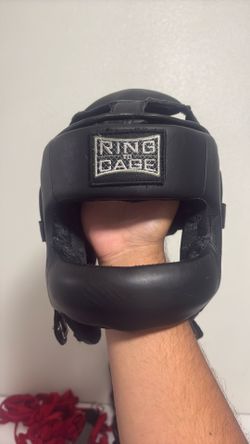 Ring to cage nose bar headgear