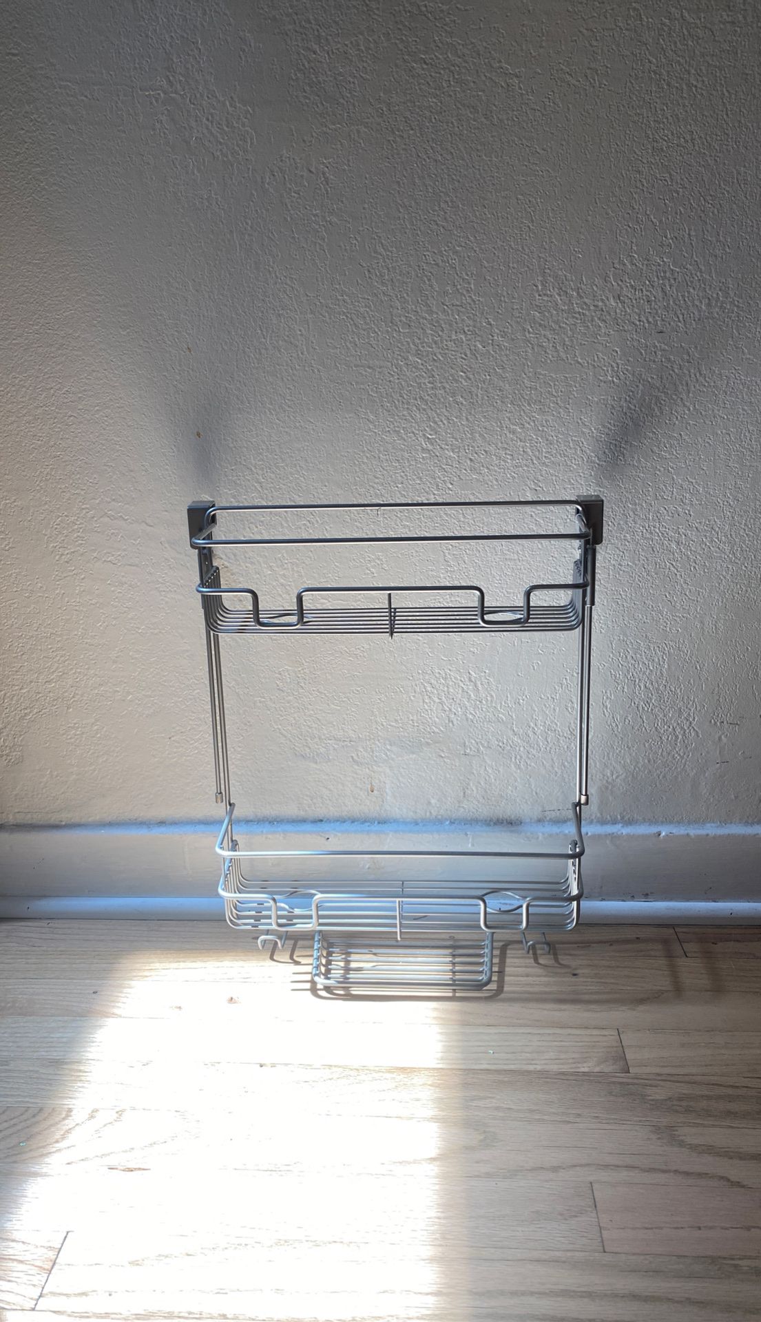 Over the shower door rack