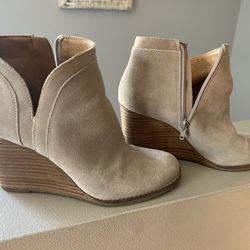 Tan suede wedge ankle boots with zipper closure. Size 7
