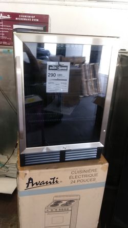 New open box. Mini fridge stainless