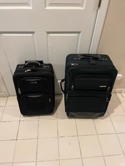 2 Nice Clean Suit cases - see details