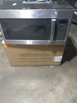G.E. 17 cu. ft. 30 in. W. Over-the-Range Microwave Oven with EasyClean in Stainless Steel 
NEW