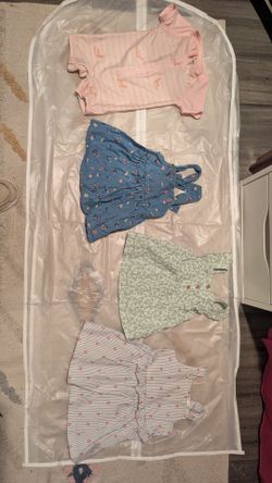 3 dresses and 1 bathing suit 6/9 months