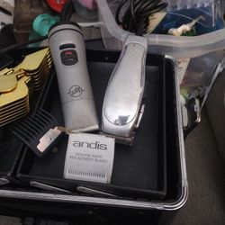 2 Andis Hair Clippers  With Extra Blades And Accessories 