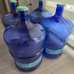 5 Gallon Primo Water Bottles with caps, 4 Bottles