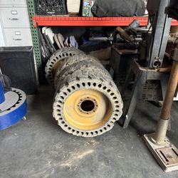 Skid Steer Solid Tires / Wheels