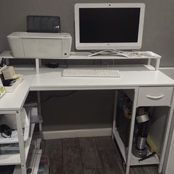 Desk and computer and printer