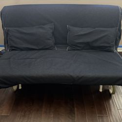 Metal White Framed Futon With Wheels. 
