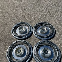 Set of classic buick riviera hubcaps